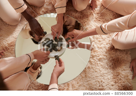 Girl Performing Lithomancy Ritual Girl Performing Lithomancy Ritual 88566300