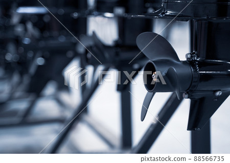 closeup of row of black boat ship propellers closeup of row of black boat ship propellers 88566735
