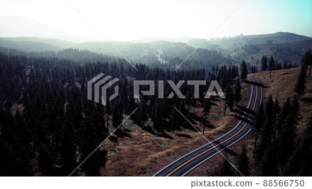 Aerial view of the old road going through pass in the Swiss Alps Aerial view of the old road going through pass in the Swiss Alps 88566750