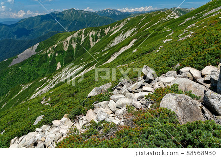 Mt. Kurobegoro and Mt. Yakushi seen from the ridgeline of Mt. Nuketo in the Northern Alps Mt. Kurobegoro and Mt. Yakushi seen from the ridgeline of Mt. Nuketo in the Northern Alps 88568930