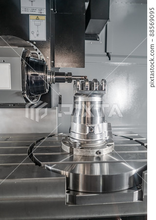 Metalworking CNC milling machine. Cutting metal modern processing technology. Metalworking CNC milling machine. Cutting metal modern processing technology. 88569095