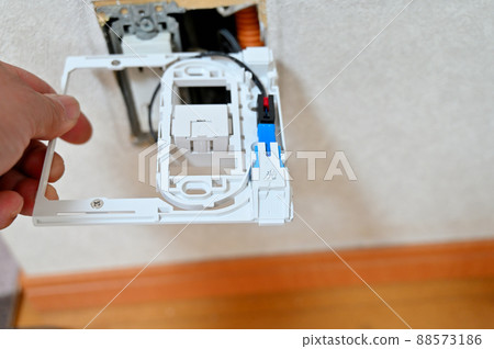 Internet optical line (optical fiber), a man who works on opening construction Internet optical line (optical fiber), a man who works on opening construction 88573186