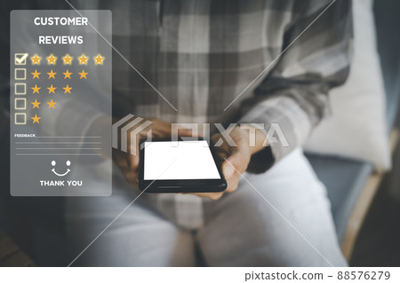 Customer service and Satisfaction concept ,Women hand hold smart phone empty screen choose the 5 star icon to give satisfaction in service. rating very impressed in coffeeshop. 88576279