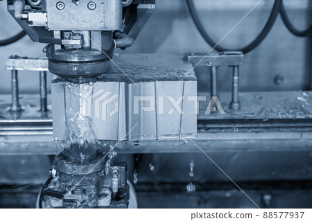 The wire EDM machine cutting the mold insert parts. 88577937
