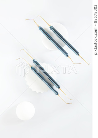 Modern dentistry. Dental instruments for work of an orthodontist. Light background. Flat lay.Top view.Copy space. 88578302