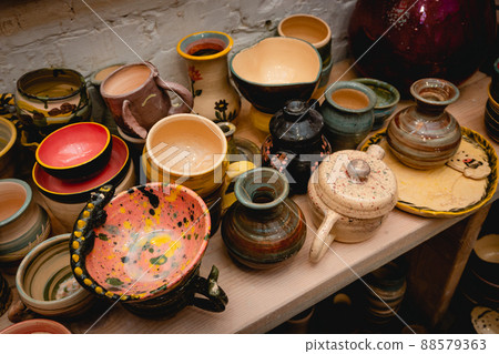 Hand made ceramic tableware, Collection of colorful clay pottery ceramics. Hand made ceramic tableware, Collection of colorful clay pottery ceramics. 88579363