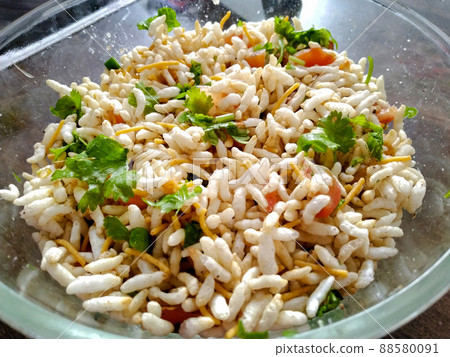 Bhelpuri Chaat/chat is a road side tasty food from India, served in a bowl or plate. selective focus 88580091