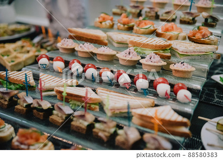 Delicacies and snacks at the buffet or banquet. Catering. Delicacies and snacks at the buffet or banquet. Catering. 88580383