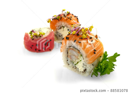 traditional japanese food sushi. tempura sushi maki with shrimp and avocado isolated on white background traditional japanese food sushi. tempura sushi maki with shrimp and avocado isolated on white background 88581078