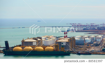 Industrial Port for freight transport and global business. Gas tanker on loading. 88581397
