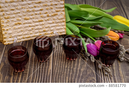 Jewish traditional Passover holiday celebration of kosher wine and matzah bread on Pesach Jewish traditional Passover holiday celebration of kosher wine and matzah bread on Pesach 88581770