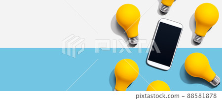 Smartphone with yellow light bulbs 88581878