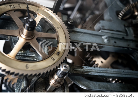 Detail Of A Mechanic Clockwork With Cogwheels Of A Vintage Clock 88582143