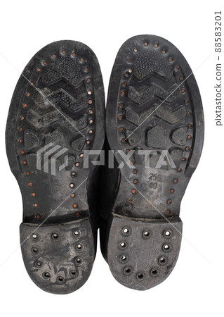 Sole print of Russian army boots. Boots made from artificial leather. Archaic combat boots and part of service dress uniform in Russia and Soviet Union Army for soldiers. Sole print of Russian army boots. Boots made from artificial leather. Archaic combat boots and part of service dress uniform in Russia and Soviet Union Army for soldiers. 88583201