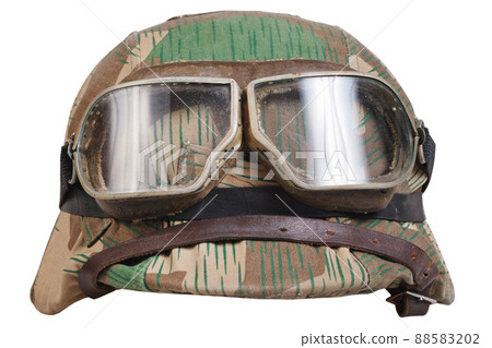 German nazi army helmet with with protective goggles and camouflage cover, type Splinter, helmet M35, M40, M42. German nazi army helmet with with protective goggles and camouflage cover, type Splinter, helmet M35, M40, M42. 88583202