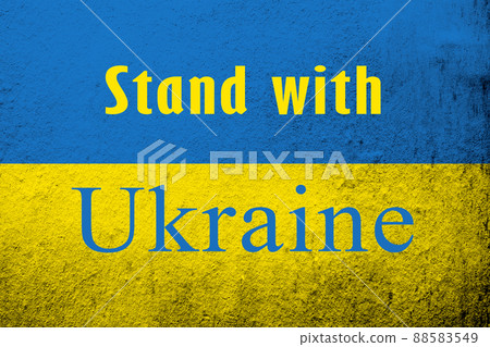 Stand with Ukaine color. .Ukrainian flag with a message against war. Grunge background Stand with Ukaine color. .Ukrainian flag with a message against war. Grunge background 88583549