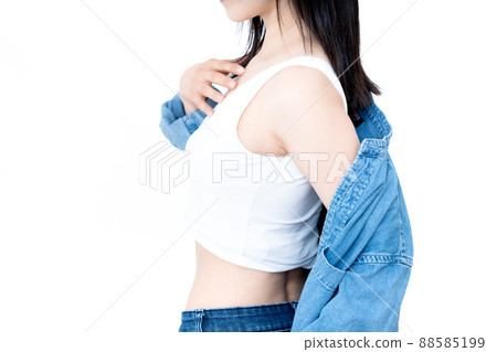 A woman wearing a denim shirt [Parts cut] 88585199