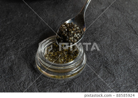 Osetra caviar spoon lift 88585924