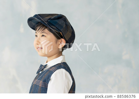 Boy in formal suit 88586376