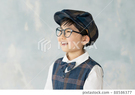 Boy in formal suit 88586377