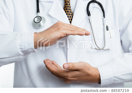 A doctor ready to help treat patients infected with COVID-19 A doctor ready to help treat patients infected with COVID-19 88587219