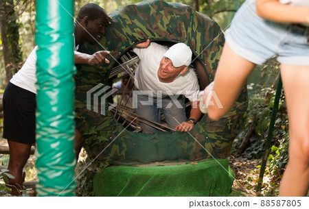 Friends having fun at adventure park Friends having fun at adventure park 88587805