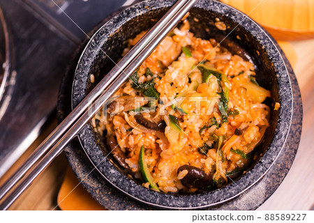 Korean traditional dish- bibimbap mixed rice with vegetables Include beef and fried egg 88589227