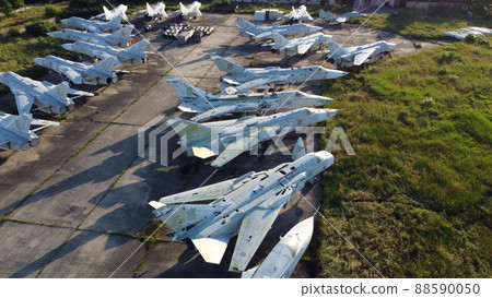 Aerial drone view flight over old rusty broken plane aircraft. Aerial drone view flight over old rusty broken plane aircraft. 88590050