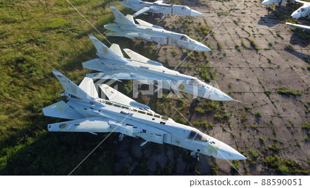 Aerial drone view flight over old rusty broken plane aircraft. Aerial drone view flight over old rusty broken plane aircraft. 88590051
