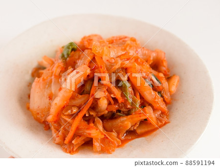 Kimchi in a bowl, handmade kimchi on a white background 88591194