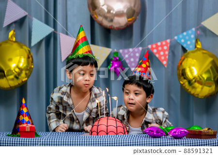 Twins adorable boy in shirt, celebrating his birthday,  88591321