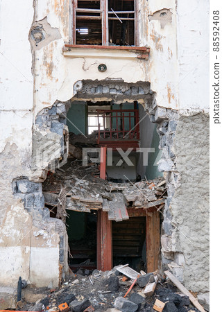 War ruins. Destroyed city after the bombing. Dead city. Bombed buildings. 88592408