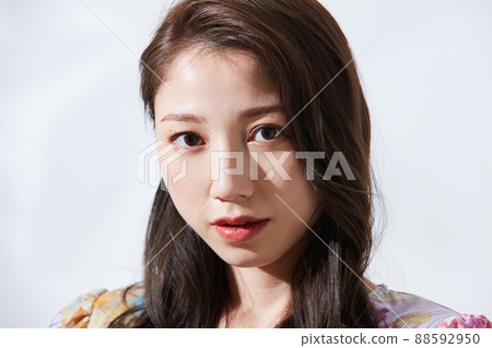 Young women in plain clothes girly fashion 88592950