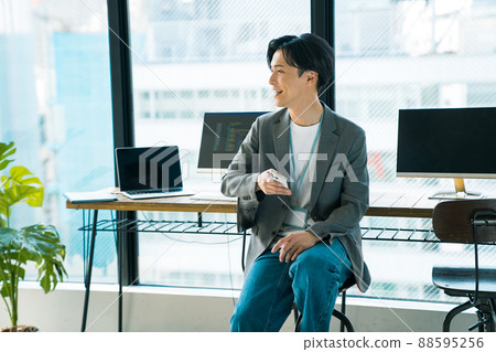 Young man working in the office 88595256