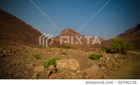 Panorama with Adrar mountain near Terjit , rocks and gorge, Mauritania 88596236