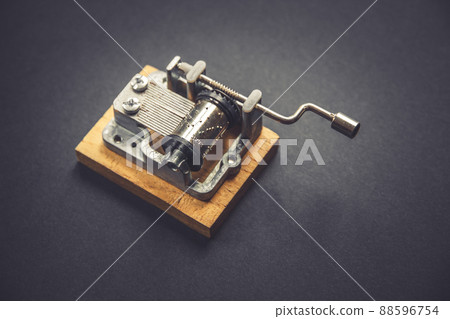 Traditional music box isolated on black 88596754
