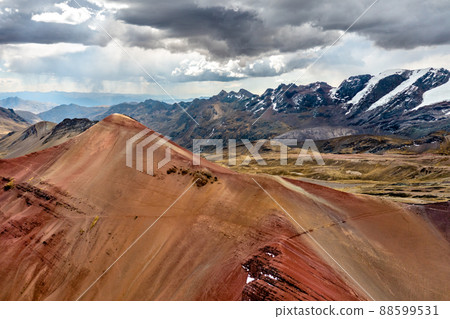 Aerial view of the Red Valley near the Vinicunca Rainbow Mountain in the Andes of Peru Aerial view of the Red Valley near the Vinicunca Rainbow Mountain in the Andes of Peru 88599531