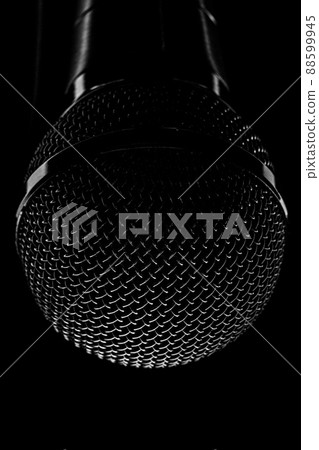 Round steel classic microphone on black background. Musical equipment for concert. Vocalist's Round steel classic microphone on black background. Musical equipment for concert. Vocalist's 88599945