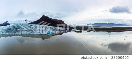 Glacier lake panoramic view with massive glaciar tongue Glacier lake panoramic view with massive glaciar tongue 88600405