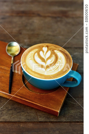 Latte coffee on wooden table, Coffee time Latte coffee on wooden table, Coffee time 88600650