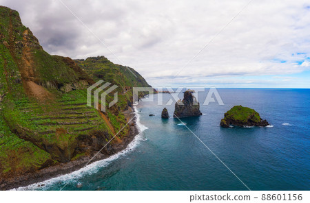 Aerial view of Ribeira da Janela volcanic sea stacks in Madeira island, Portugal Aerial view of Ribeira da Janela volcanic sea stacks in Madeira island, Portugal 88601156