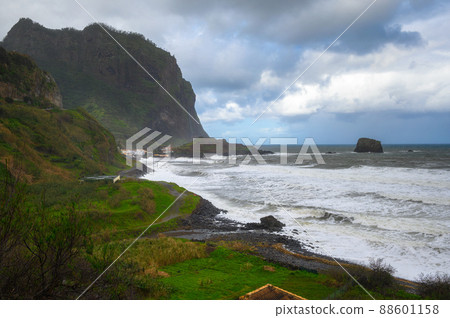 Coast and cliffs near Santana in the Madeira Islands, Portugal 88601158