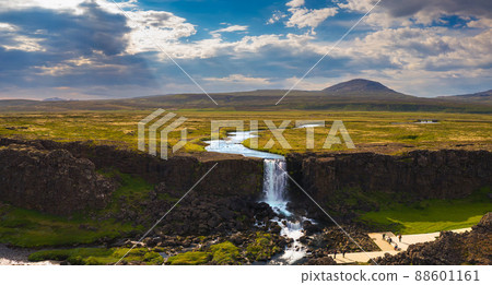 Aerial view of the Oxarafoss waterfall with tourists in Iceland Aerial view of the Oxarafoss waterfall with tourists in Iceland 88601161