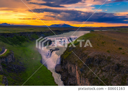 Aerial view of sunset over Gullfoss waterfall and the Olfusa river in Iceland Aerial view of sunset over Gullfoss waterfall and the Olfusa river in Iceland 88601163