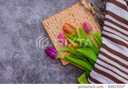 Pesach celebration holiday flowers matzah bread with Jewish Passover Pesach celebration holiday flowers matzah bread with Jewish Passover 88603097