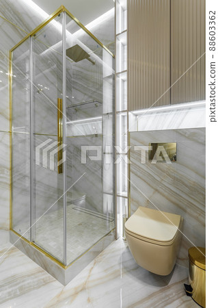 Marble tile wall and marble sink, luxury bathroom interior. 88603362