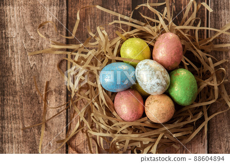 Colorful easter eggs on wooden background. . Happy Easter background. Colorful easter eggs on wooden background. . Happy Easter background. 88604894