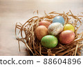 Colorful easter eggs on wooden background. . Happy Easter background. 88604896
