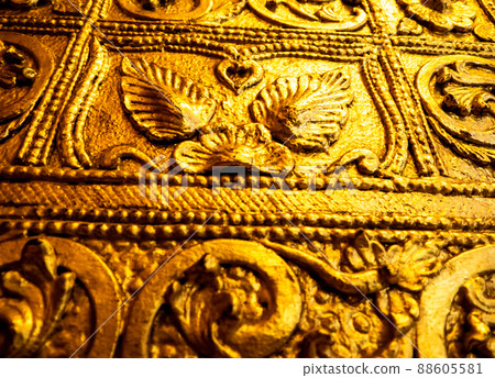 Beautiful Burmese art pattern motifs decorative design on the golden walls of the rooms in the temple Beautiful Burmese art pattern motifs decorative design on the golden walls of the rooms in the temple 88605581