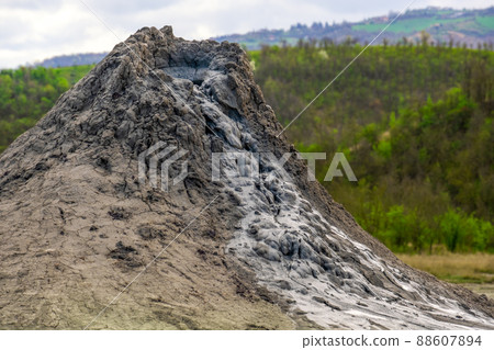 mud volcano or mud dome in Italy, geological phenomenon by eruption of mud, water and methane gas 88607894